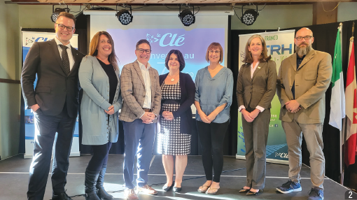 Commissioner Burke and Carl Bouchard, French Language Services Unit Director of Operations, with directors of the Clé de la Baie at the association’s annual general meeting, Penetanguishene.