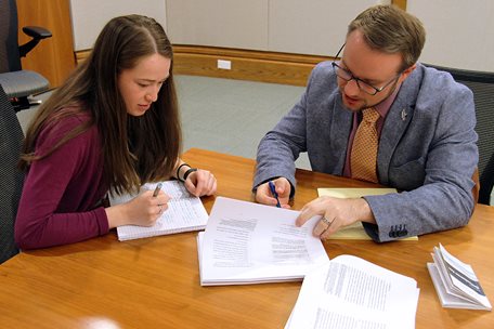 Employees of the office of the Ontario Ombudsman having a meeting