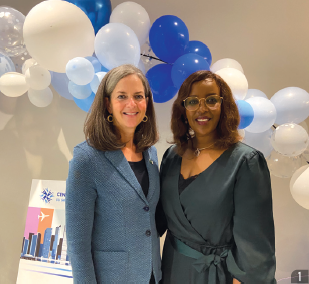 Kelly Burke and Florence Ngenzebuhoro, executive director of the Centre francophone du Grand Toronto, at the centre’s annual general  meeting, Toronto.
