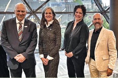 Kelly Burke with Denis Laframboise (left), president of the Société économique de l’Ontario (SÉO), and Patrick Cloutier, executive director, at an SÉO networking event, Ottawa.