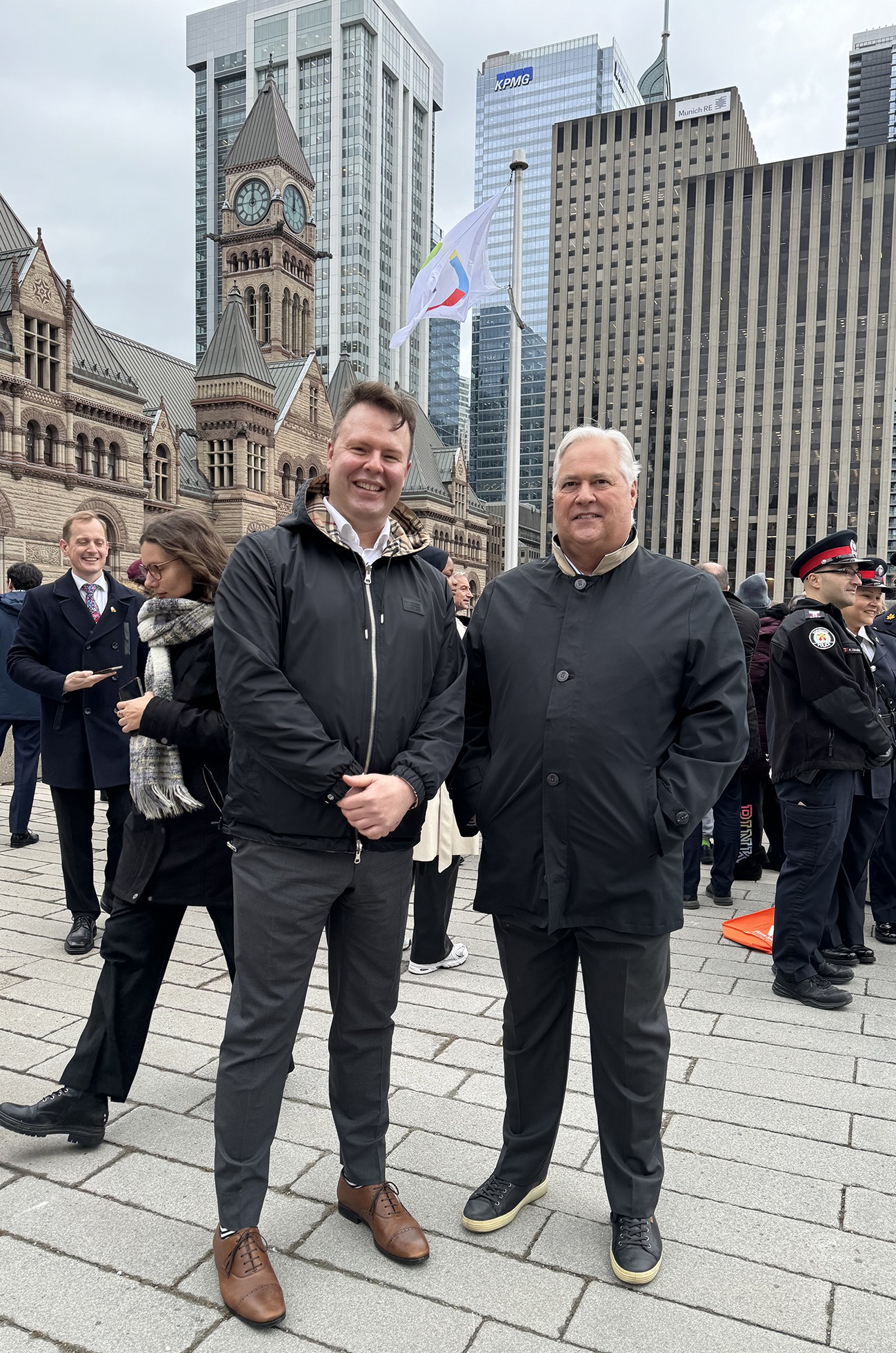 Ombudsman with French Language Services Commissioner Carl Bouchard at International Francophonie Day flag raising