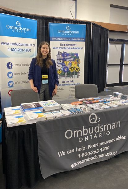 Staff member at AMCTO booth