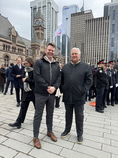 Ombudsman and Commissioner at flag raising