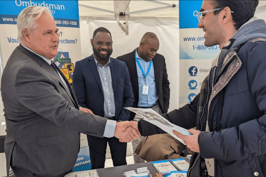 Ombudsman greeting public at an event